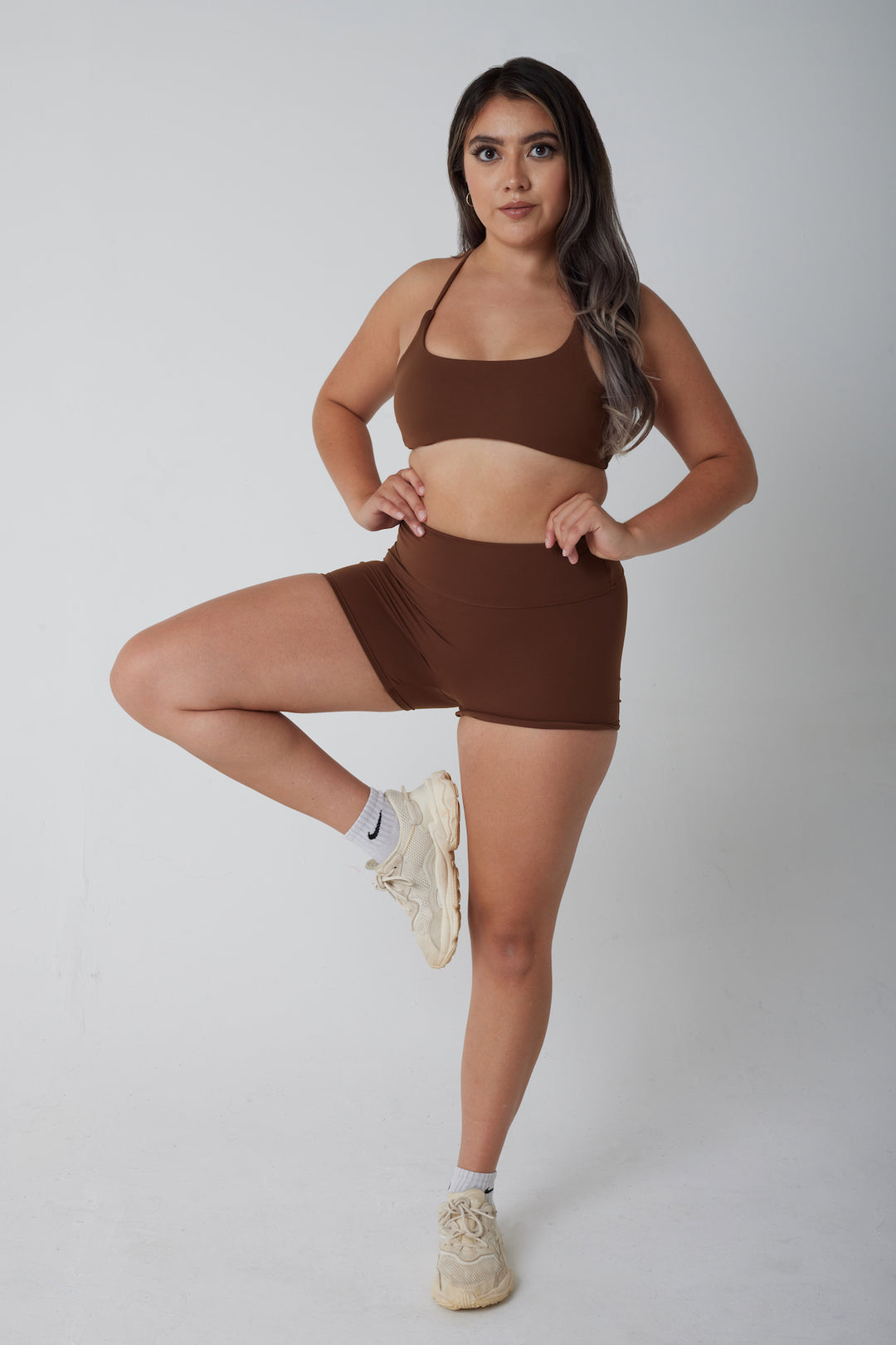 Brown Bandeau Sports Bra is a 3/4, lightweight bra. It has sustainable and comfortable cups and supportive straps