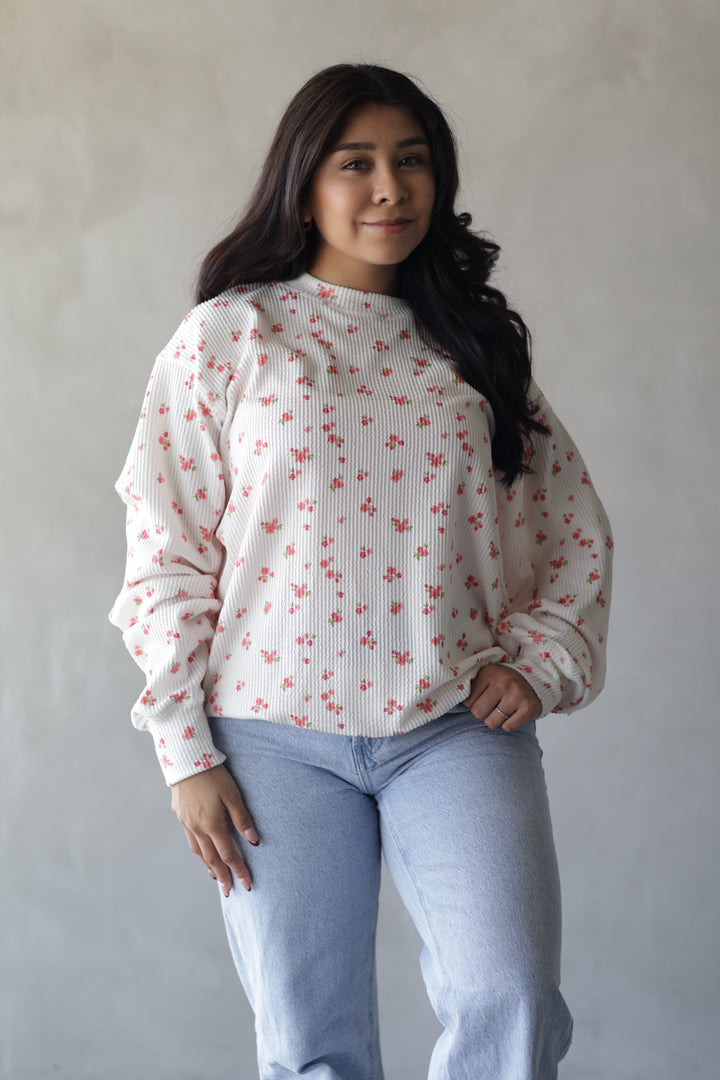 pink and white floral long sleeve top 