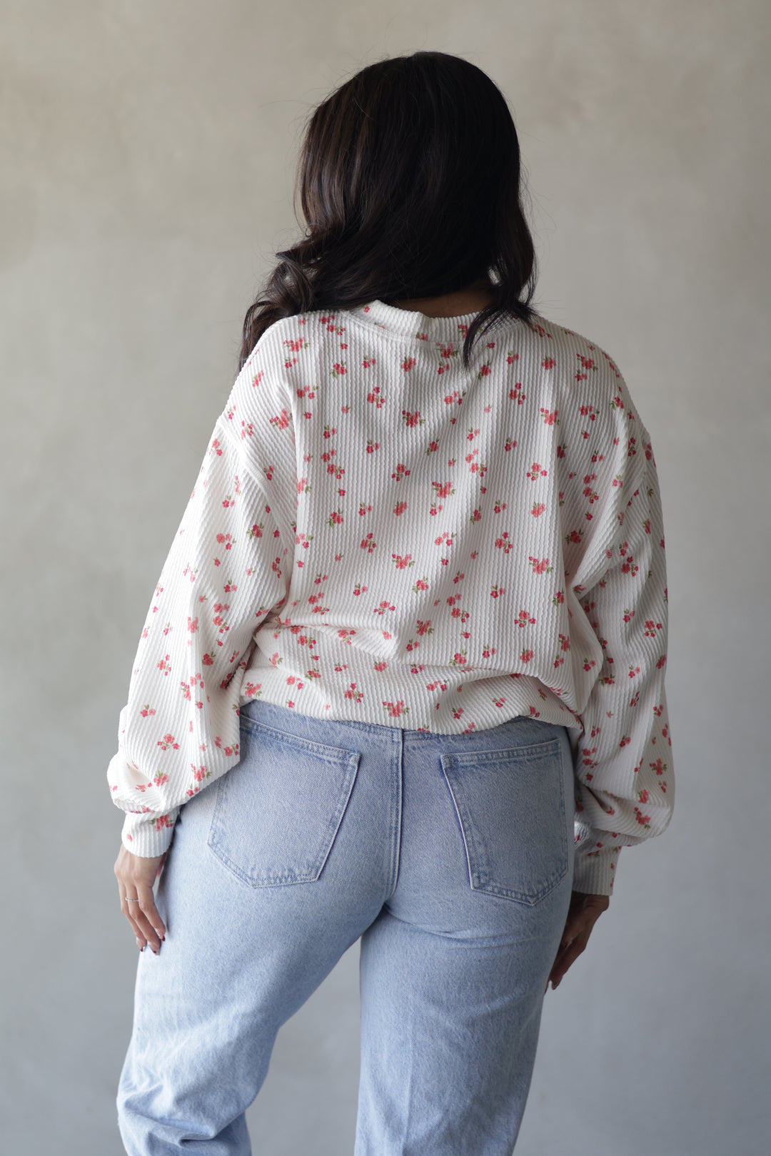 pink floral long sleeve top with white base