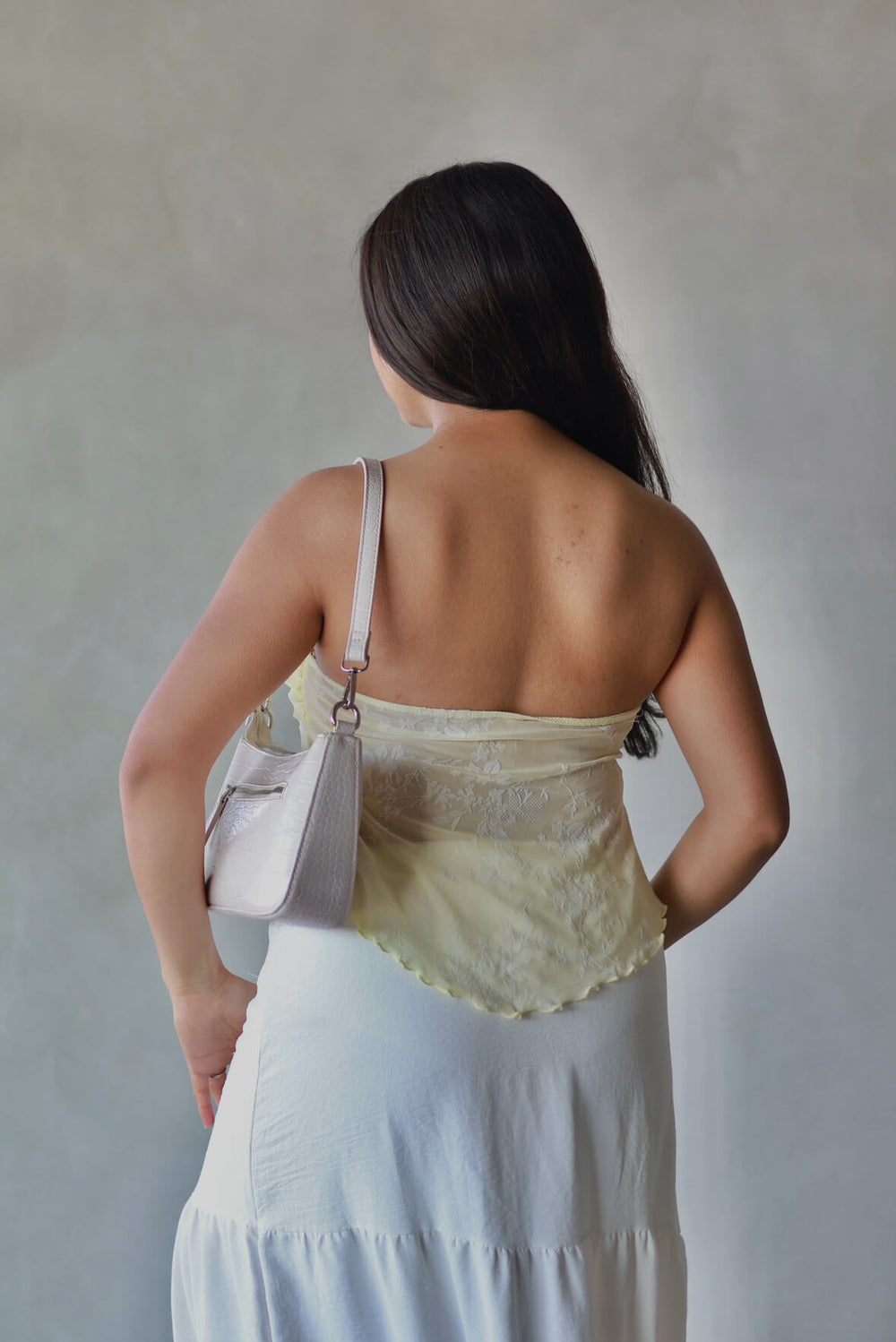 back view of yellow tube top outfit