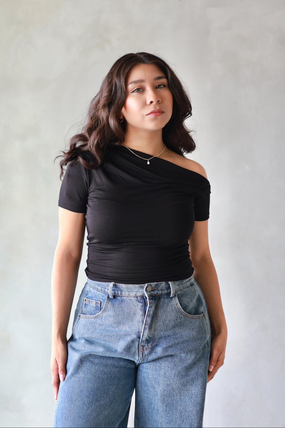 Chic black off-shoulder top for casual and night-out looks