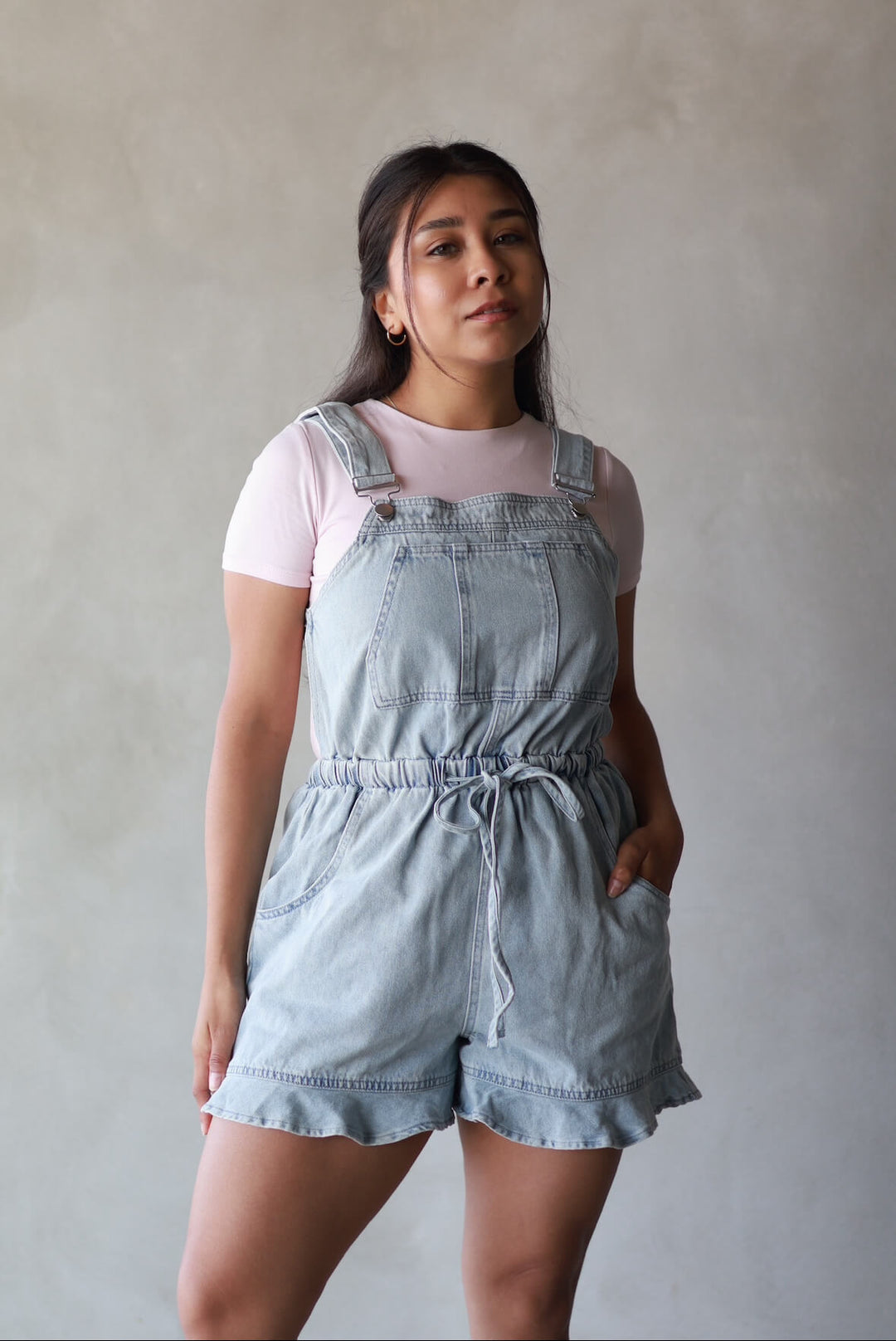 light washed ruffle hem overalls for women front view