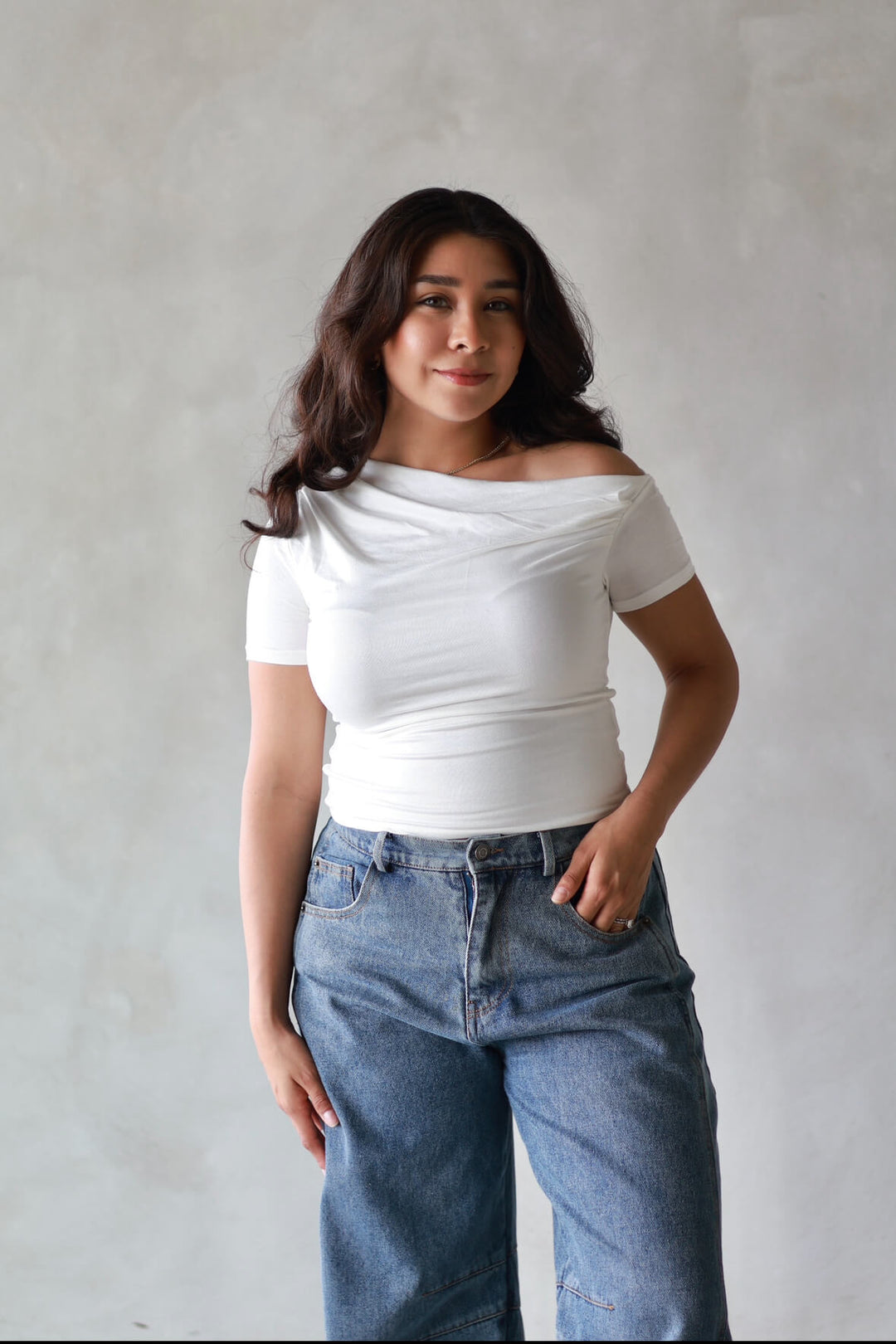 Minimalist white off-the-shoulder top for casual or dressy outfits for women