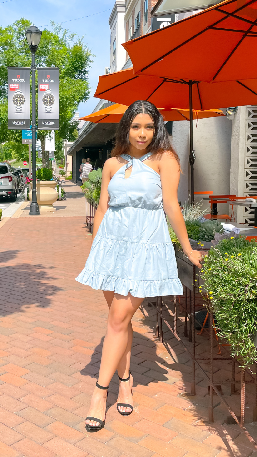 sky blue halter tie back dress that flows around the waist